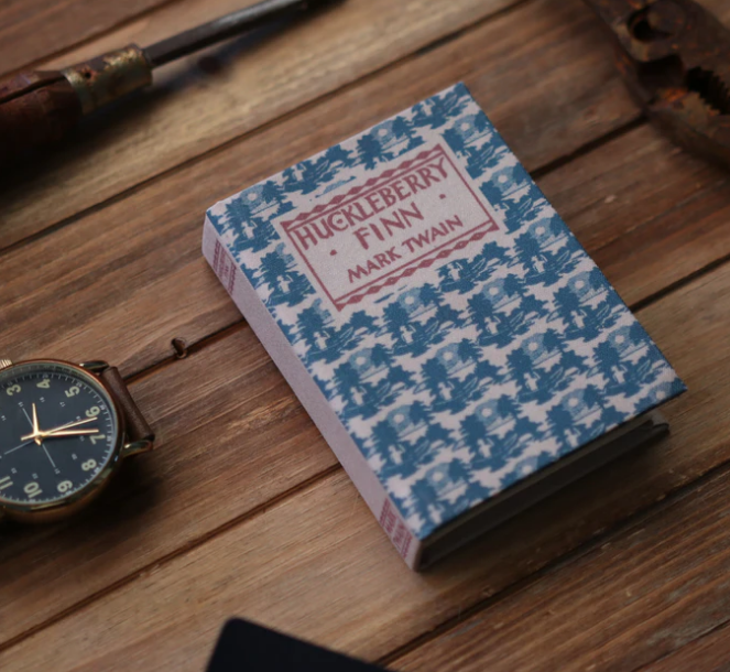 Wallets disguised as antique literature (Kickstarter Project)